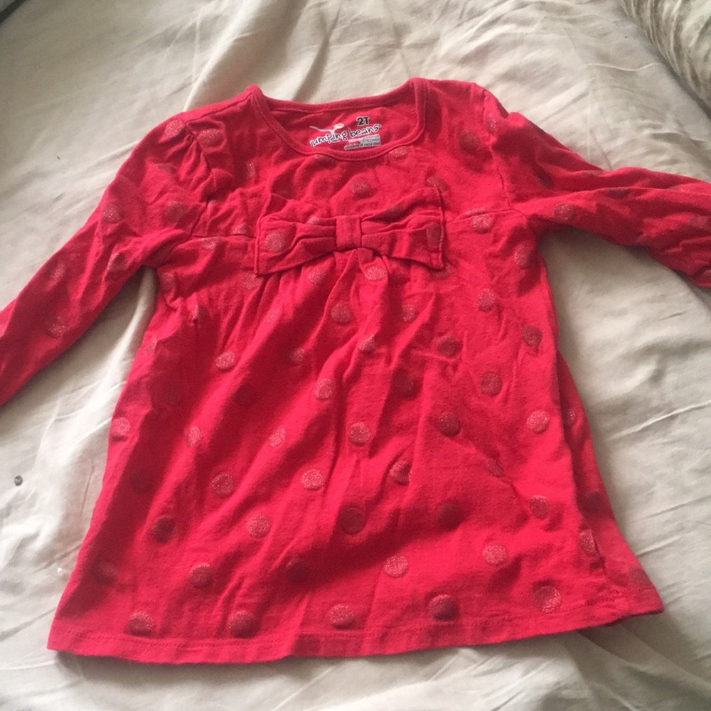 Red polka dot shirt